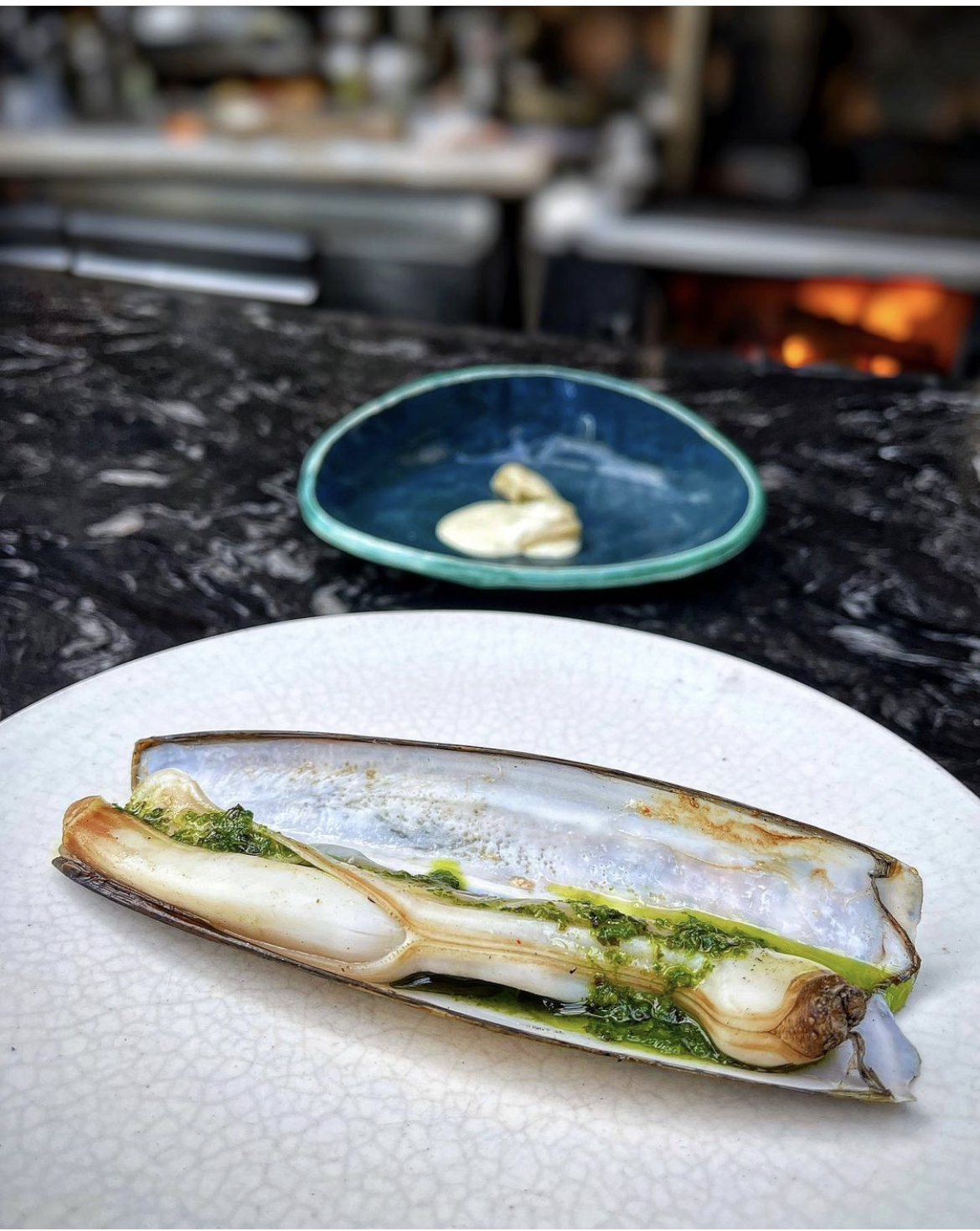 Razor clam with herb butter — Spanish seafood inflight catering